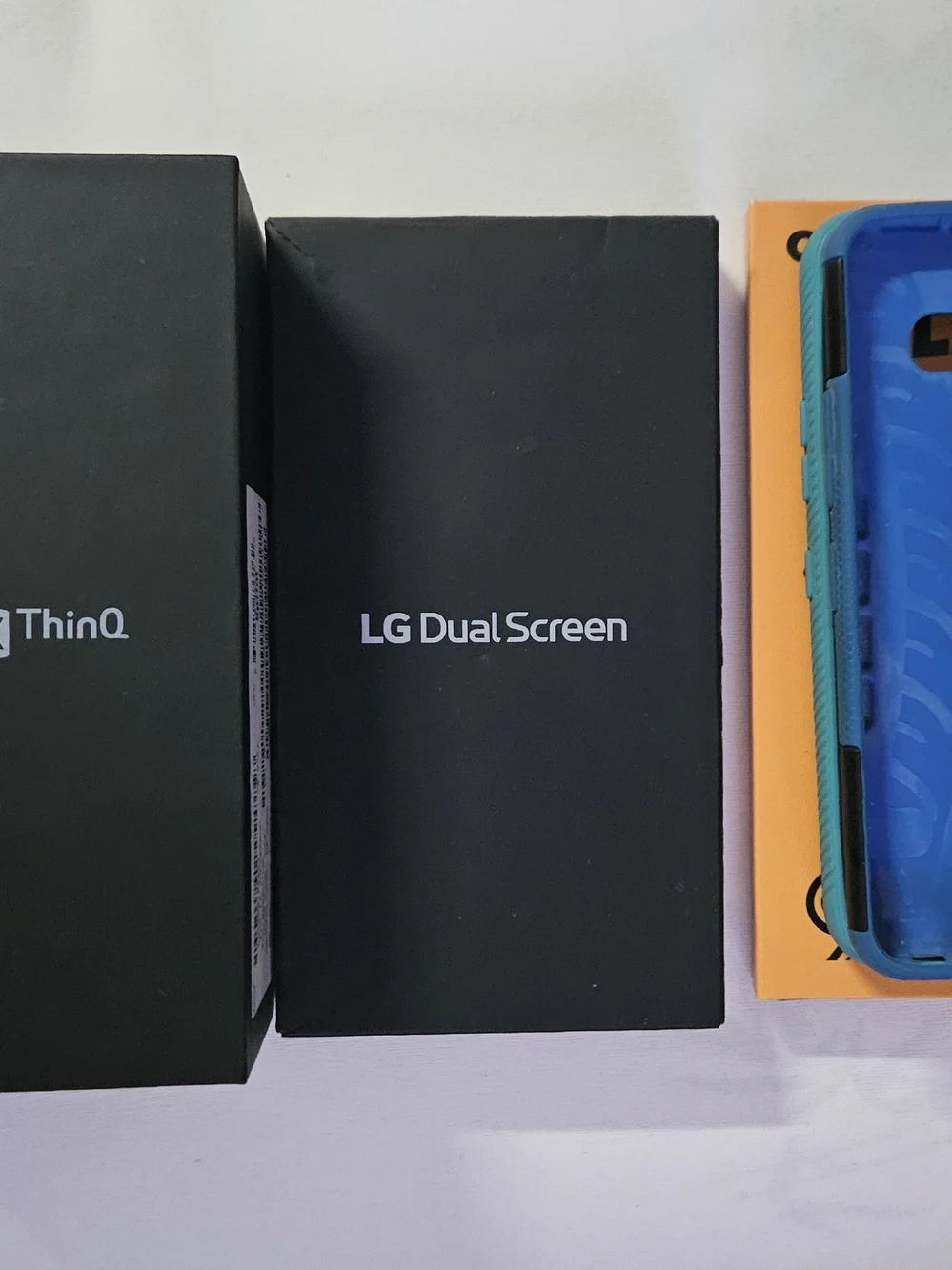 LG Blue & Teal Protective Phone Cases with Charging Cable and Accessories